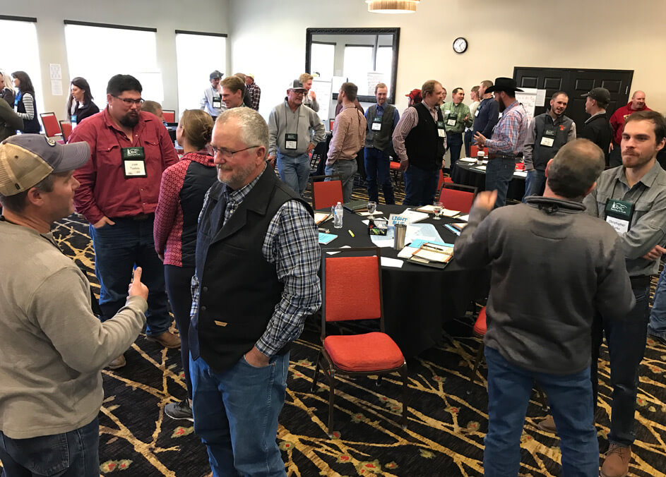 People meeting and networking at the Ranching for Profit School